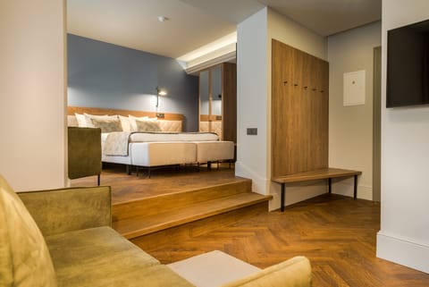 Junior Suite, 1 Bedroom, City View | Minibar, in-room safe, desk, laptop workspace