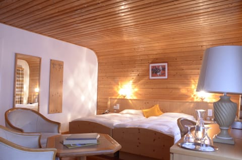 Premium bedding, down comforters, in-room safe, desk