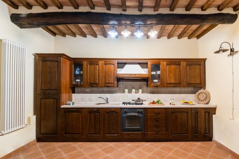 Apartment, Patio, Annex Building (I Cipressi ) | Private kitchen | Full-size fridge, oven, stovetop, cookware/dishes/utensils