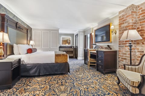 Junior Suite, 1 King Bed | In-room safe, individually decorated, desk, blackout drapes