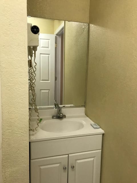 Combined shower/tub, hair dryer, towels, soap