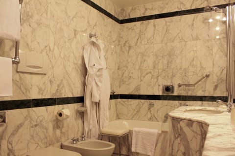 Combined shower/tub, free toiletries, hair dryer, bathrobes