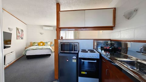 Apartment, 1 Bedroom | Desk, iron/ironing board, free WiFi, bed sheets