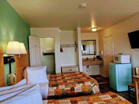 Traditional Room, 2 Double Beds, Refrigerator & Microwave | 1 bedroom, desk, laptop workspace, blackout drapes