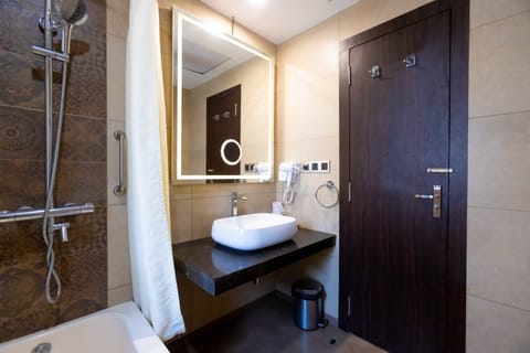 Suite, 1 Bedroom | Bathroom | Shower, free toiletries, hair dryer, towels