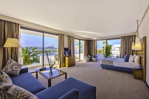 Premium Suite (River View) | Minibar, in-room safe, individually decorated, individually furnished