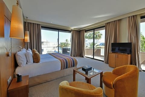 Premium Suite (River View) | Minibar, in-room safe, individually decorated, individually furnished