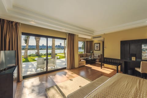 Presidential Suite (Garden View) | Living area | 42-inch LCD TV with satellite channels, TV