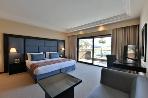 Premium Room (River View) | Minibar, in-room safe, individually decorated, individually furnished