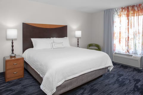Premium bedding, memory foam beds, desk, blackout drapes