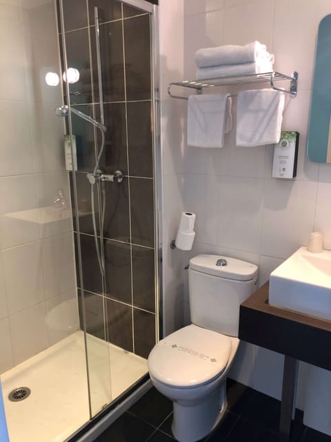 Eco-friendly toiletries, hair dryer, towels