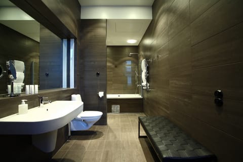 Suite (Signature Suite) | Bathroom | Separate tub and shower, rainfall showerhead, free toiletries