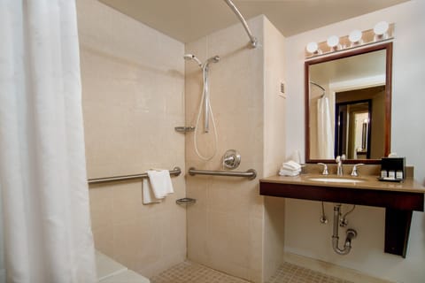 Combined shower/tub, designer toiletries, hair dryer, towels