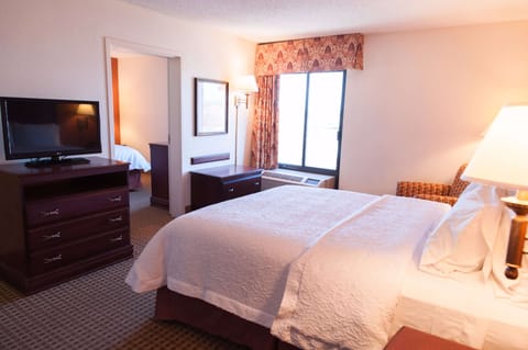 Suite, 2 Queen Beds, Non Smoking | In-room safe, soundproofing, iron/ironing board, free cribs/infant beds