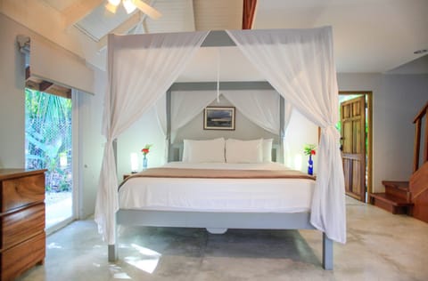 Deluxe Quadruple Room, Multiple Beds, Beachside (Casa Cassandra) | In-room safe, free WiFi, bed sheets