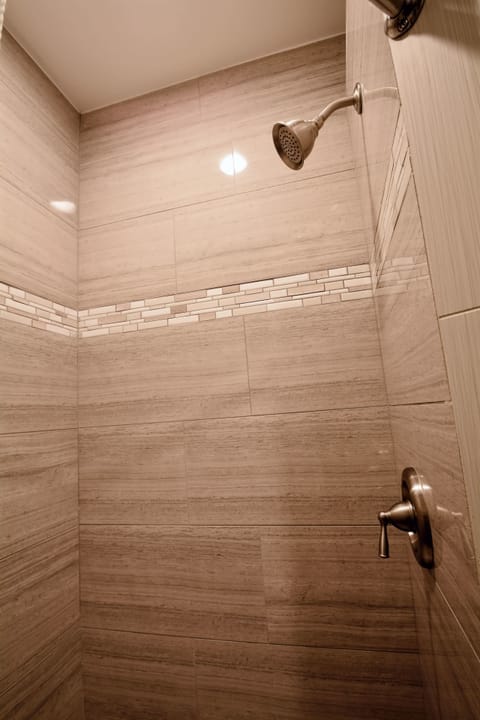 Honeymoon Room | Bathroom | Shower, hair dryer, towels