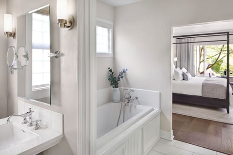 Ascher | Bathroom | Combined shower/tub, designer toiletries, hair dryer, bathrobes