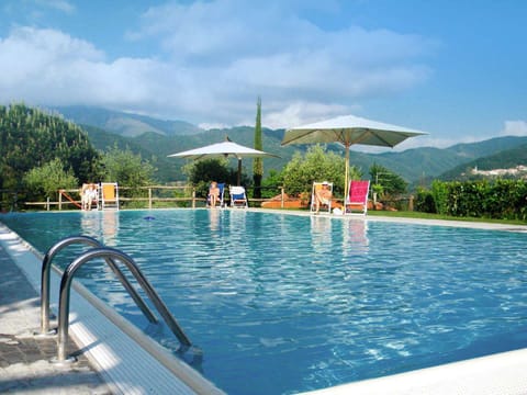 Seasonal outdoor pool, pool umbrellas, sun loungers