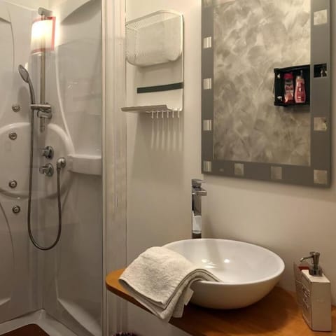 Superior Room | Bathroom | Hair dryer, towels, soap, shampoo