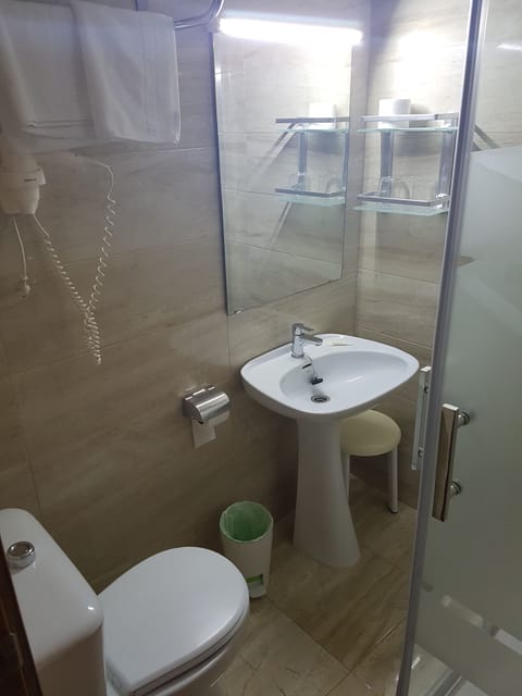 Shower, deep soaking tub, free toiletries, hair dryer