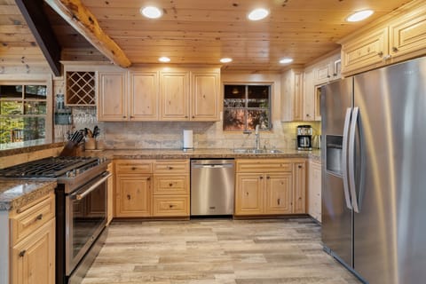 Chef's kitchen with stainless steel appliances
