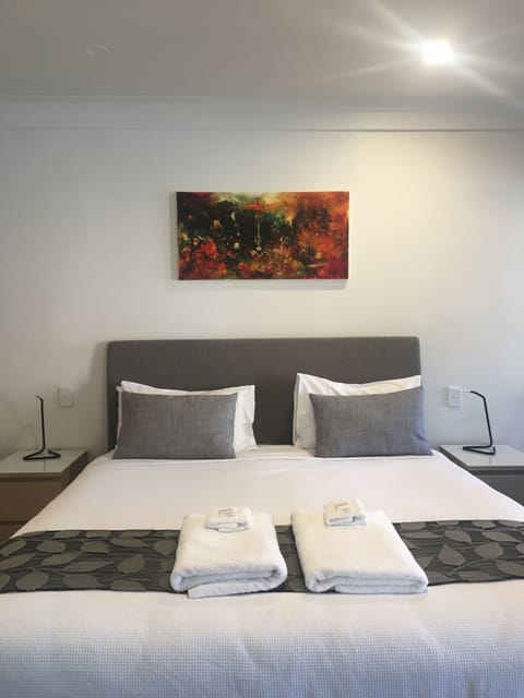 Deluxe Room, 1 King Bed, Jetted Tub, Ground Floor | 1 bedroom, premium bedding, desk, free WiFi