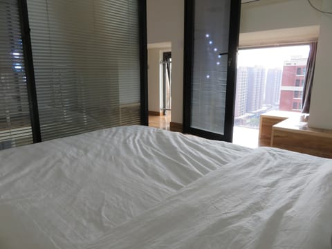 Deluxe Suite, 2 Bedrooms | Desk, blackout drapes, free WiFi