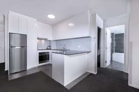 Deluxe 2 Bedroom, Bay View | Private kitchen | Fridge, microwave, stovetop, dishwasher