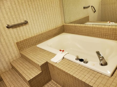 Suite, 1 King Bed, Jetted Tub | Private spa tub