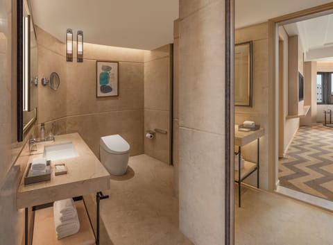 Suite | Bathroom | Shower, free toiletries, slippers, towels