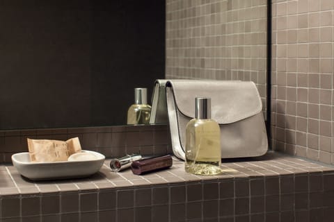 Eco-friendly toiletries, hair dryer, towels