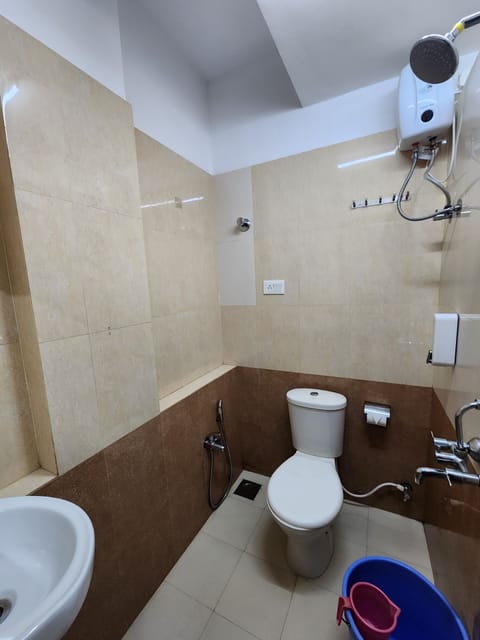 Comfort Shared Dormitory, City View | Bathroom | Shower, rainfall showerhead, soap, shampoo