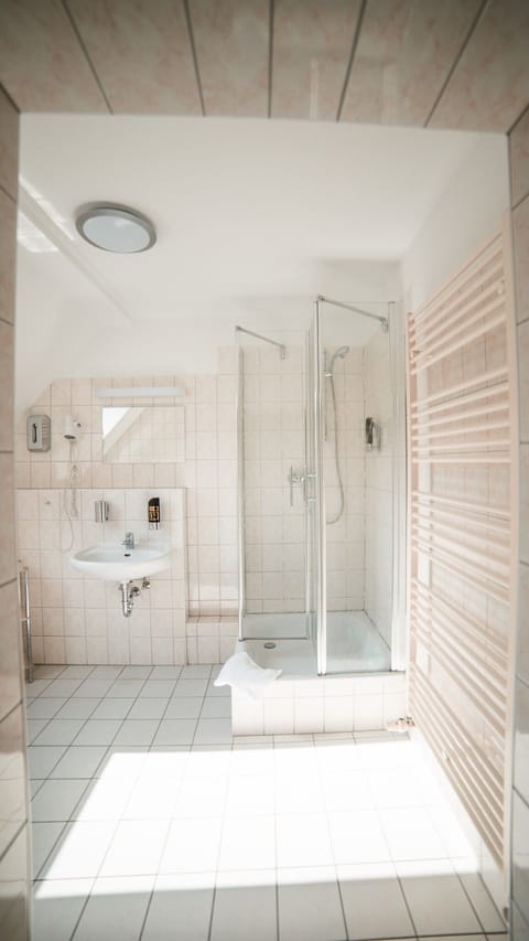 Triple Room | Bathroom | Shower, hair dryer, towels, soap