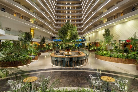 3 bars/lounges, poolside bar, beach bar