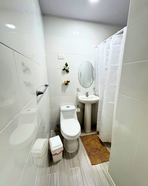 Deluxe Triple Room, Pool View | Bathroom | Free toiletries, hair dryer, towels, soap