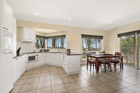 Cunninghame Cottage | Private kitchen | Fridge, microwave, stovetop, coffee/tea maker