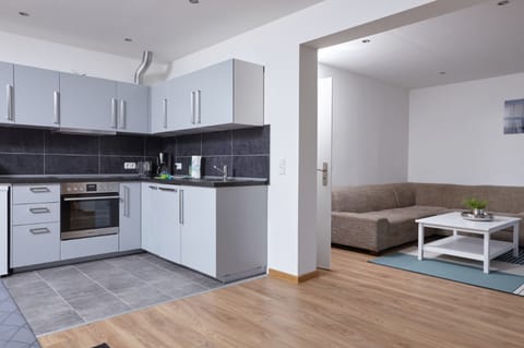 Deluxe Apartment (6) | Private kitchen | Full-size fridge, microwave, stovetop, coffee/tea maker