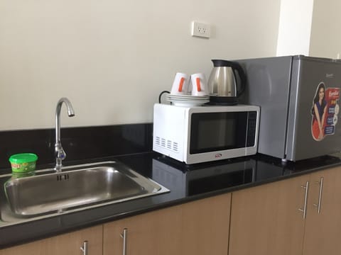 Condo, 1 Bedroom, City View | Mini-refrigerator