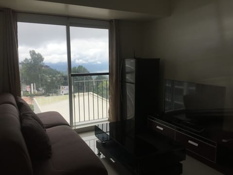 Condo, 2 Bedrooms | Living area | Flat-screen TV