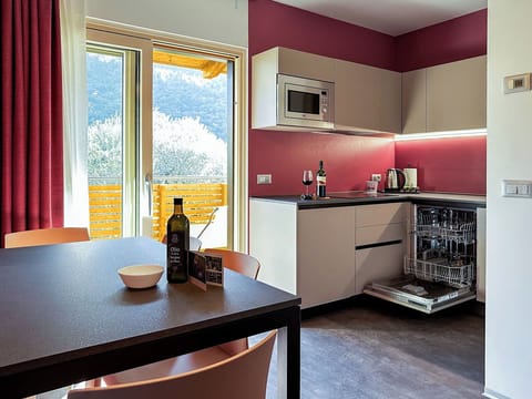 Panoramic Suite | Private kitchen | Coffee/tea maker, electric kettle, highchair