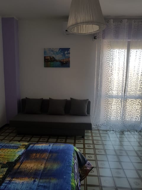 Quadruple Room | Blackout drapes, iron/ironing board, rollaway beds, free WiFi