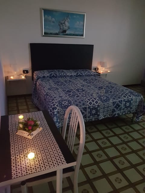 Quadruple Room | Blackout drapes, iron/ironing board, rollaway beds, free WiFi