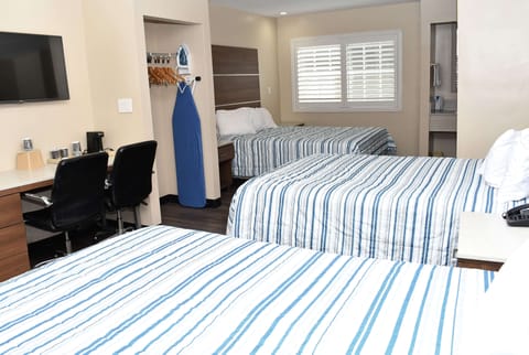 Room, Multiple Beds, Non Smoking | Iron/ironing board, rollaway beds, free WiFi, bed sheets