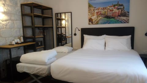 Standard Triple Room | In-room safe, blackout drapes, iron/ironing board, free WiFi