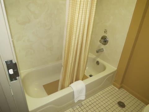 One King Bed, Non-Smoking | Bathroom | Hair dryer, towels