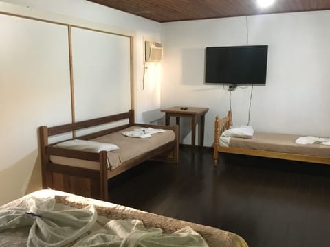 Standard Triple Room | Minibar, iron/ironing board, free WiFi, bed sheets