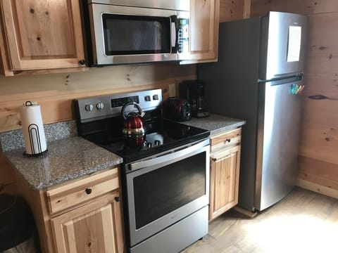 Kitchen with Range, Fridge, and Microwave