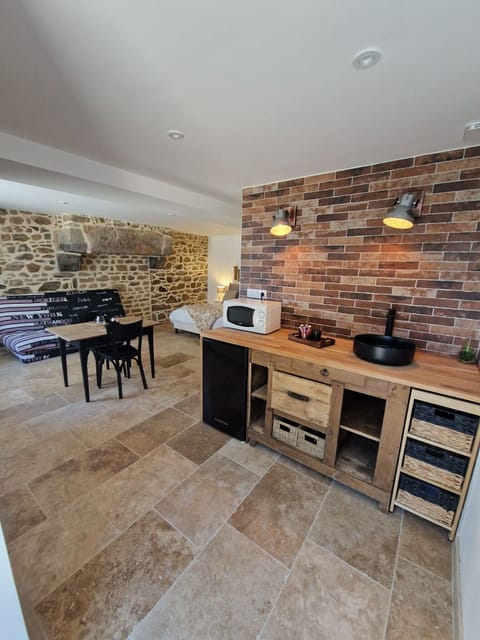 Quadruple Room | Private kitchen | Full-size fridge, microwave, stovetop, coffee/tea maker