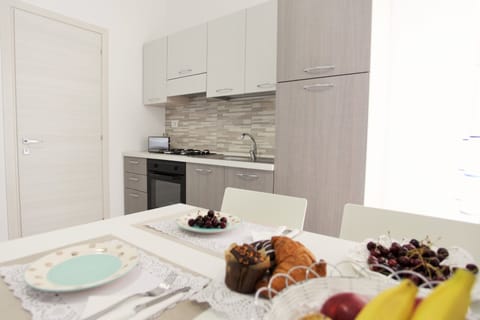 Deluxe Apartment, 1 Bedroom | Private kitchen | Fridge, oven, stovetop, dishwasher