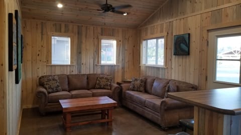 Cabin 4 | Living room | 40-inch flat-screen TV with satellite channels, TV, heated floors
